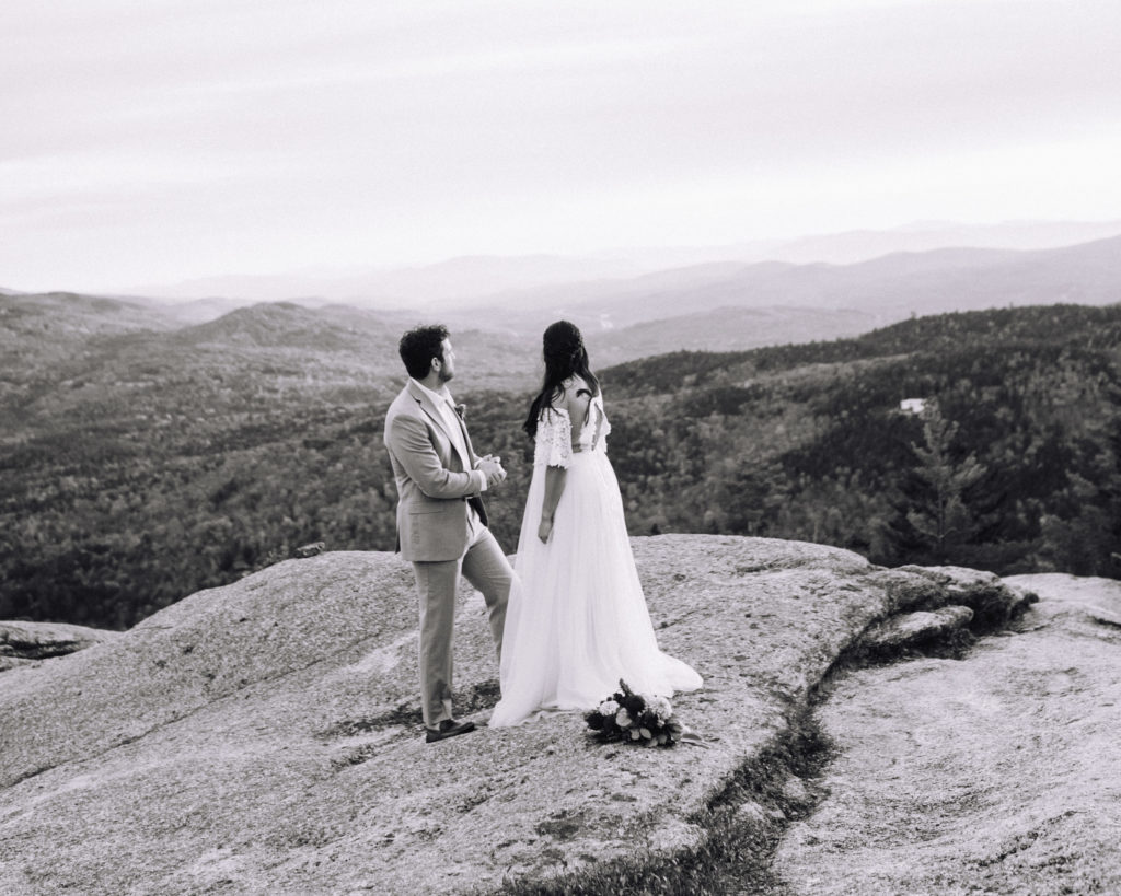 bride and groom enjoy the landscape in the White Mountains in New Hampshire