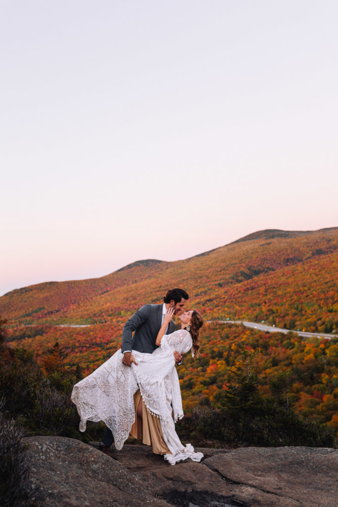 Man dips bride in the White Mountains